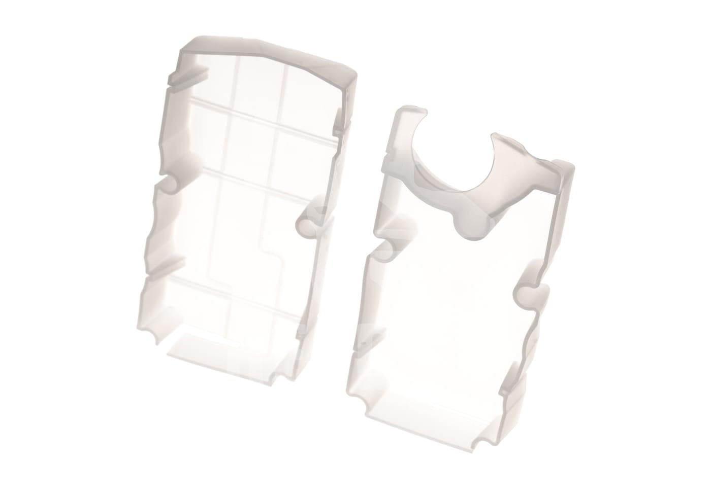 Durchsichtige Kunststoffhalterungen für Airsoft-Magazine, zwei parallel nebeneinander liegend.