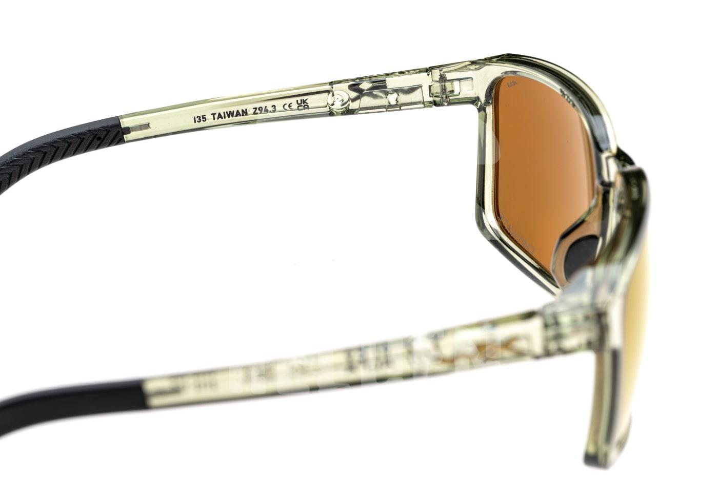 Klarer Seitensicht einer Schutzbrille mit orangefarbenen Gläsern, Gummibügel und eingeprägtem Text. Ideal für Airsoft.
