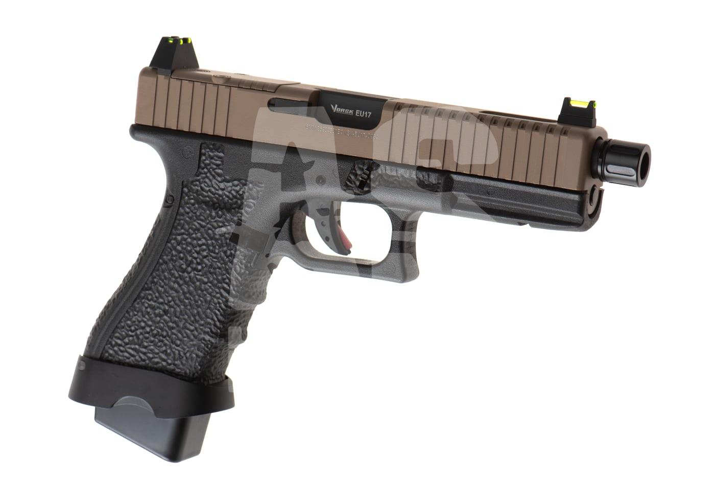 Airsoft-Pistole mit strukturiertem Griff und braunem Verschluss, seitliche Ansicht.