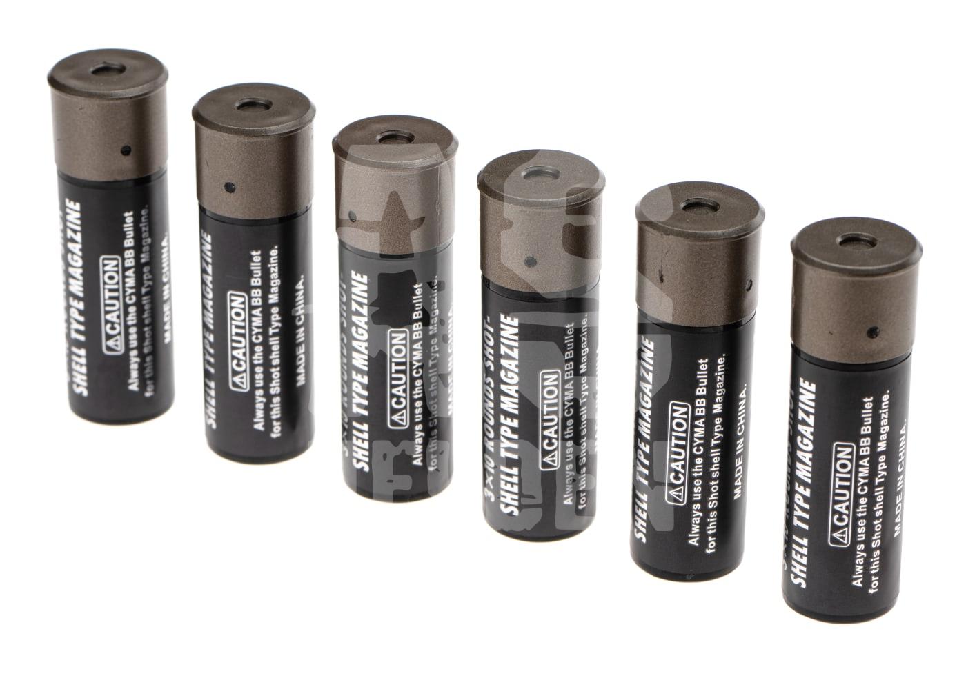Sechs schwarze Airsoft-Shell-Magazine mit Warnhinweis, stehend.