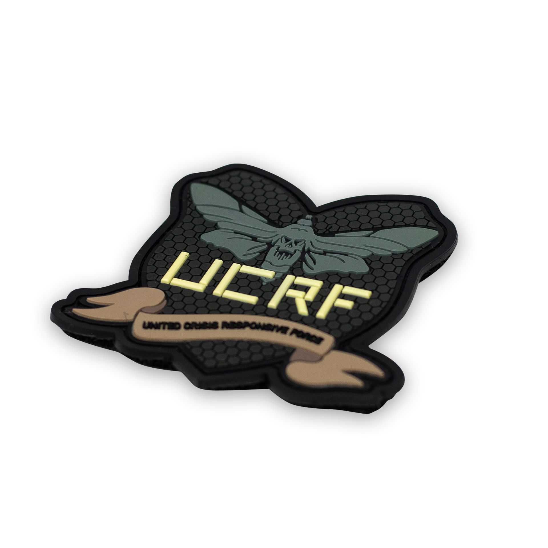 Airsoft-Patch mit Totenkopfmotte und UCRF-Schriftzug auf schwarzem Hintergrund.