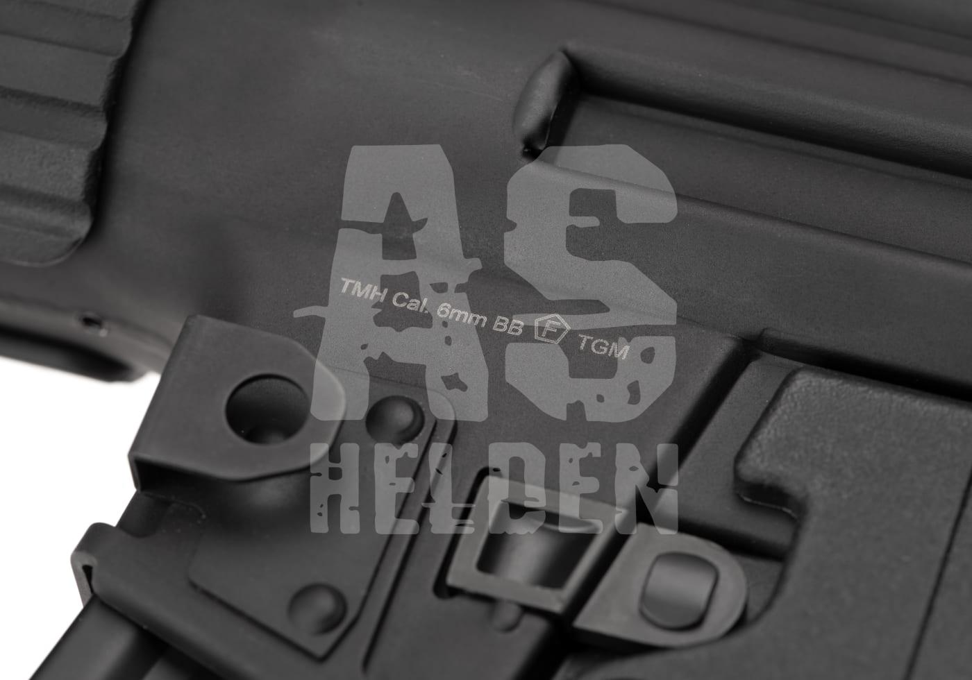G&G TGM A3 E.T.U. S-AEG - ab 18 Jahren Detail einer Airsoft-Waffe mit Gravur "TMH Cal. 6mm BB F".