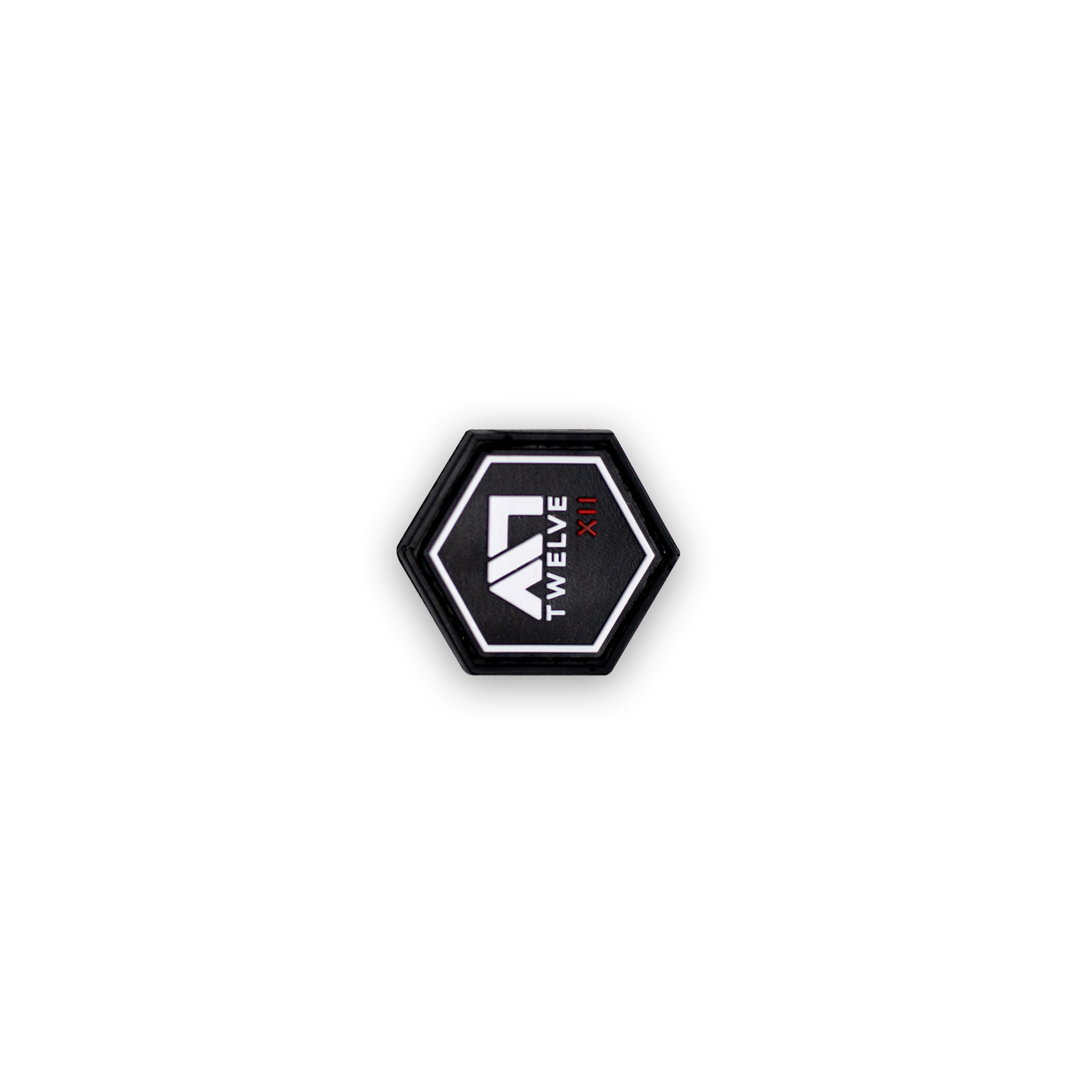 Schwarzer, sechseckiger Patch mit weißem "TWELVE XII" Schriftzug auf Airsoft-Zubehör.