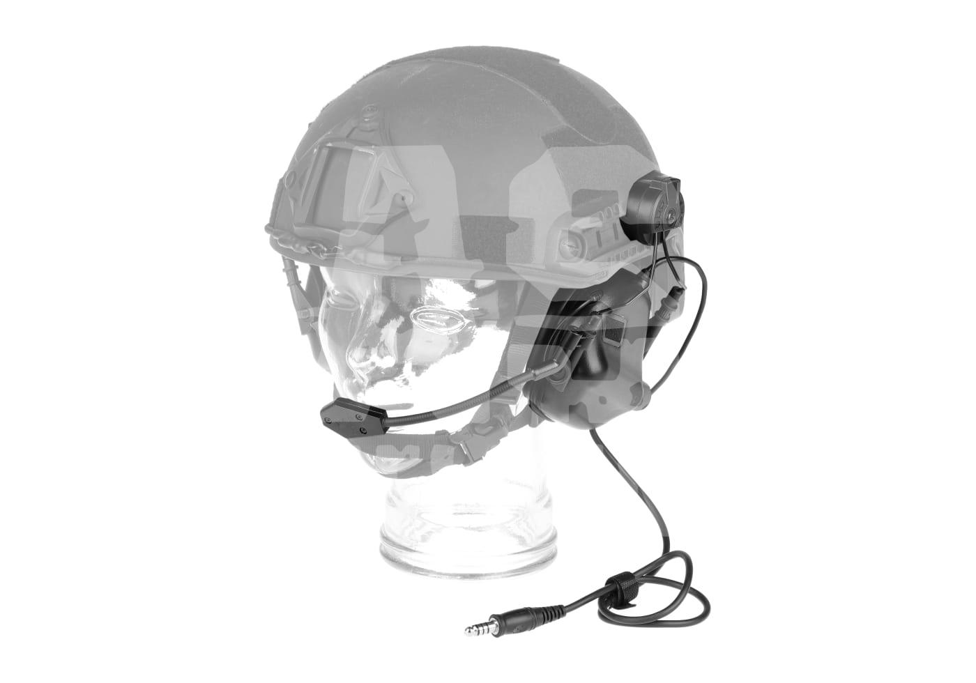 Taktischer Helm mit Headset und Mikrofon auf einem durchsichtigen Kopfmodell.