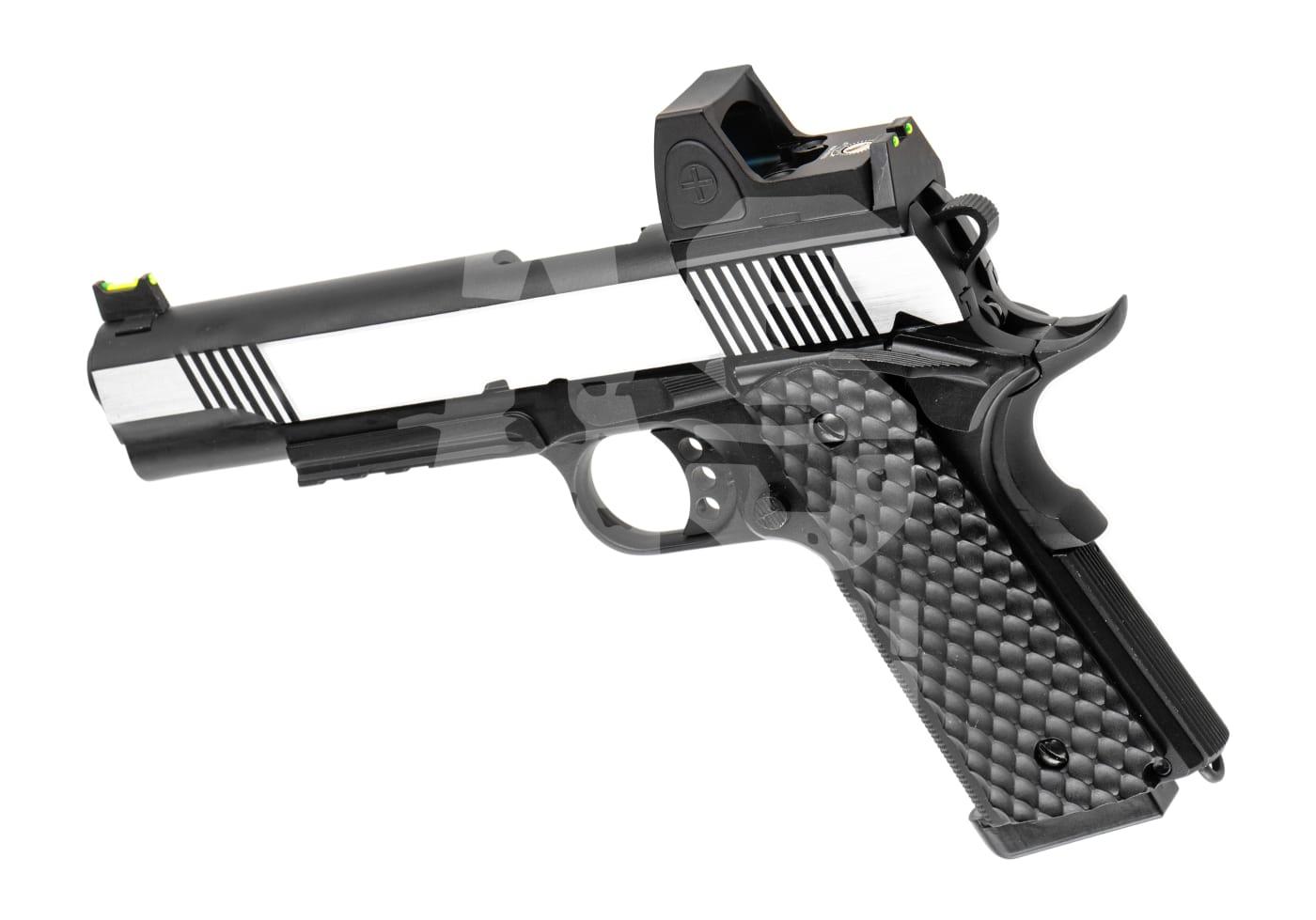 Airsoft-Pistole mit Reddot-Visier, schwarzem Griff und weiß-schwarzen Akzenten auf dem Verschluss.
