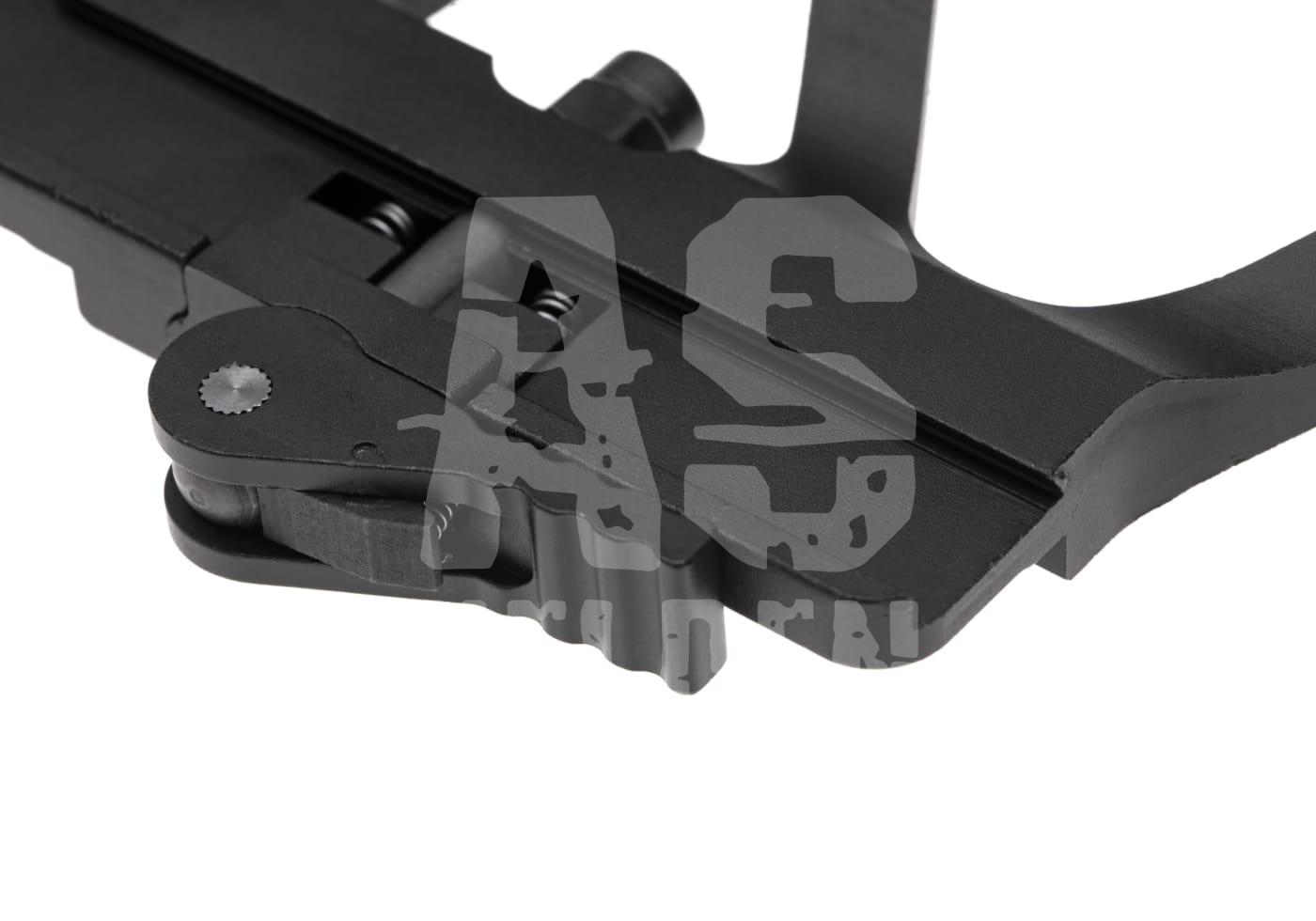 Schwarzes Airsoft-Zubehörteil in Nahaufnahme, technische Details sichtbar.