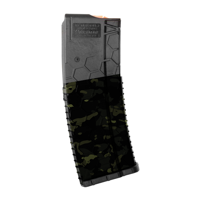 Airsoft-Magazin mit schwarzem Tarnmuster, sechseckige Oberflächenstruktur.