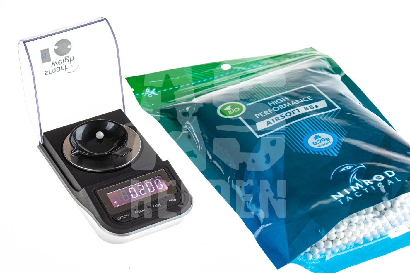 Nimrod 0.20g Bio BB High Performance 5000rds Digitalwaage und Beutel mit 0,20g Bio Airsoft BBs von Nimrod Tactical.