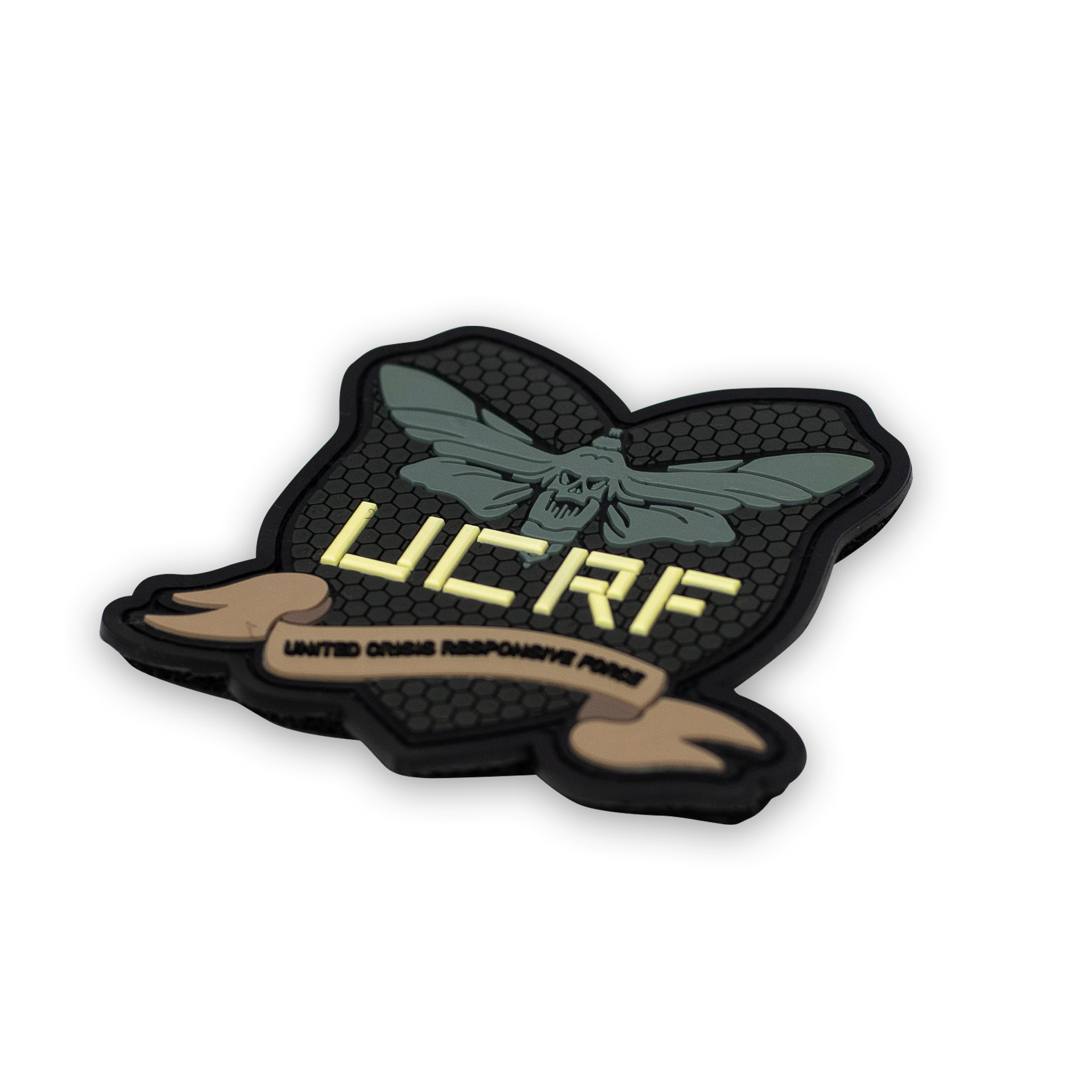 Airsoft-Patch mit Totenkopfmotte und UCRF-Schriftzug auf schwarzem Hintergrund.