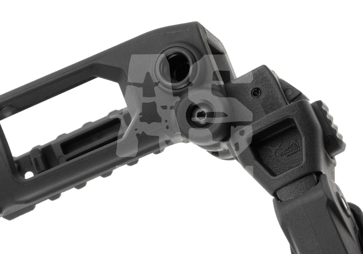 Schwarzer Airsoft-Schulterstütze-Faltmechanismus aus Kunststoff, Detailaufnahme von Gelenk und Schrauben.