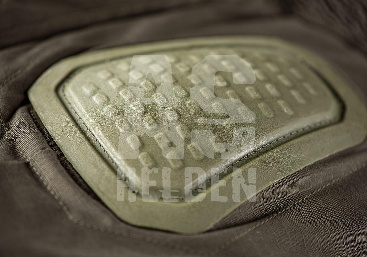 Predator Combat Pant Grüne Kniepolsterung auf taktischer Hose, Nahaufnahme. Perfekt für Airsoft-Einsätze.