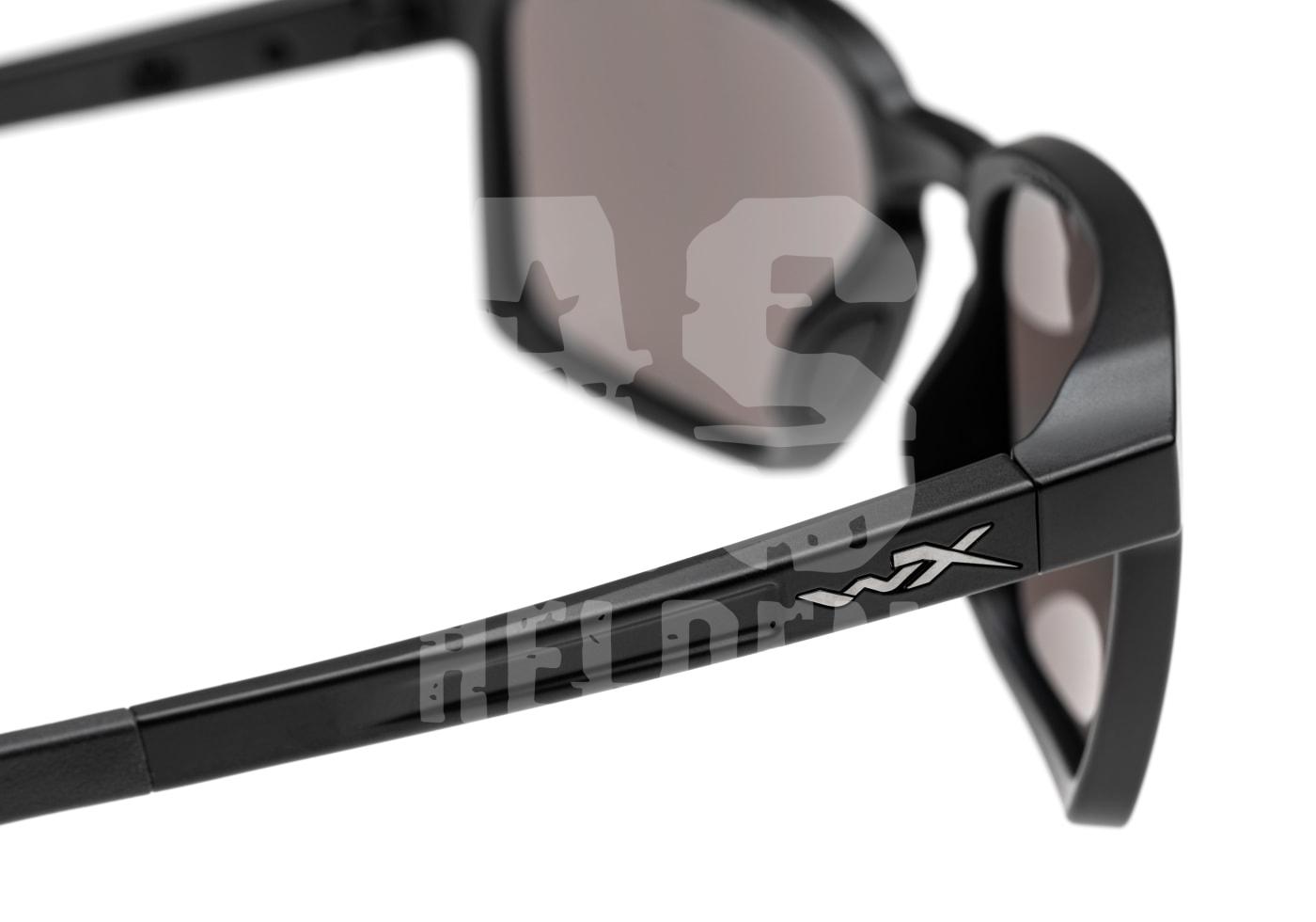 Schwarze Schutzbrille mit getönten Gläsern und seitlichem WX-Logo, seitliche Nahaufnahme.