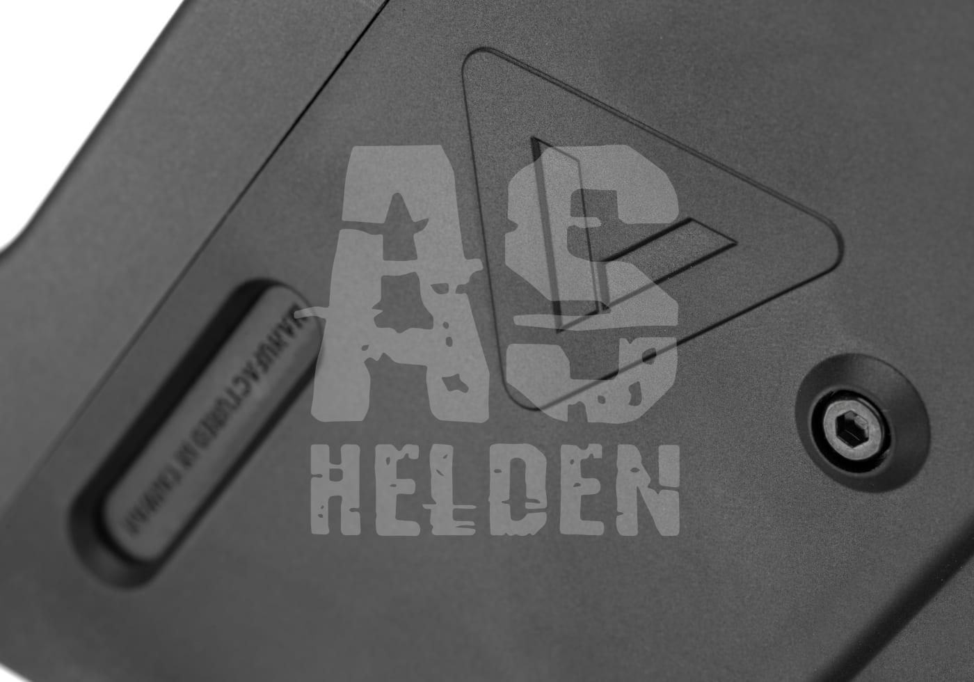 Krytac Kriss Vector S-GBB schwarz - ab 18 Jahren Nahaufnahme einer strukturierten Oberfläche mit Schraube und eingraviertem Dreiecksmuster.