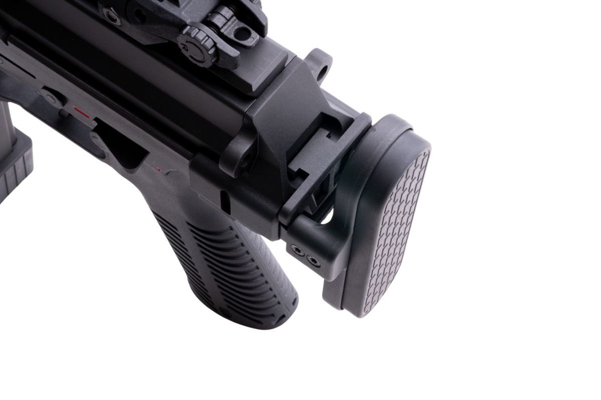 Archwick B&T APC9-K SD2 S GBB - ab 18 Jahren Nahaufnahme einer schwarzen Airsoft-Pistolen-Schulterstütze mit Textur auf weißem Hintergrund.