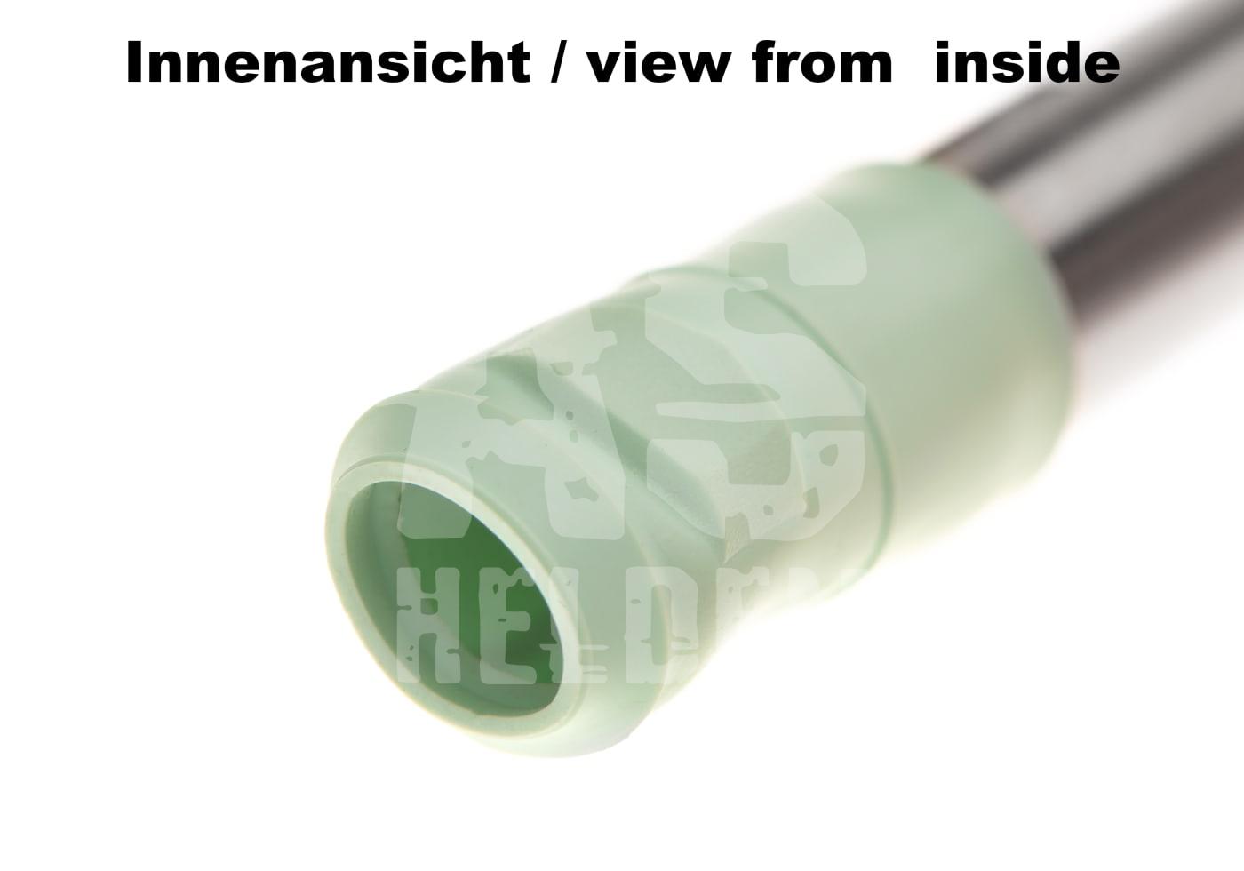 Innenansicht eines grünen Airsoft-Laufs mit glatter Textur.