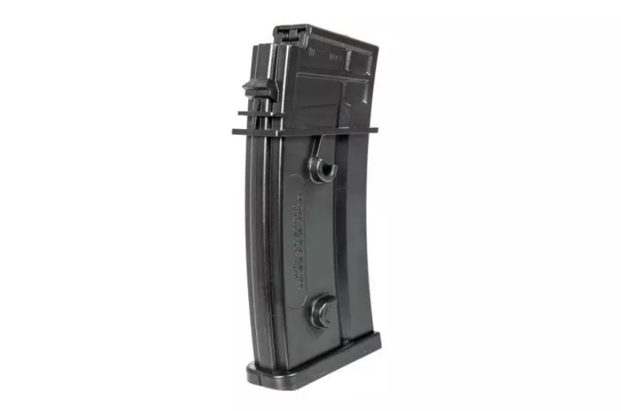 Schwarzes Airsoft-Hi-Cap-Magazin mit Kurbel und seitlichen Noppen, freigestellt auf weißem Hintergrund.