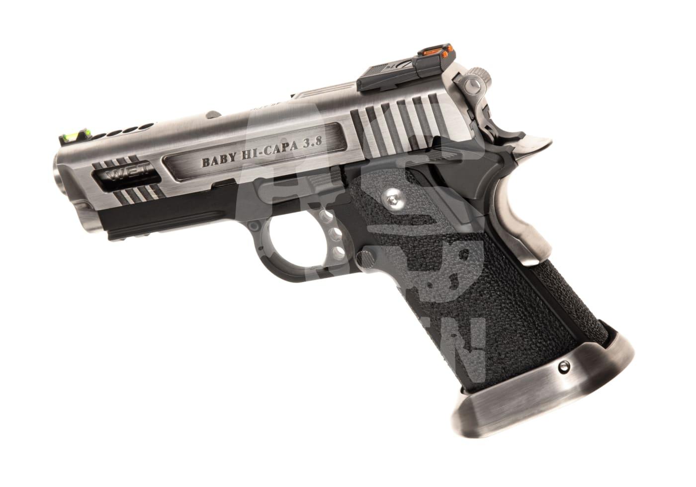 Airsoft-Pistole Baby Hi-Capa 3.8, silberner Schlitten, schwarze Griffschalen, metallische Optik.