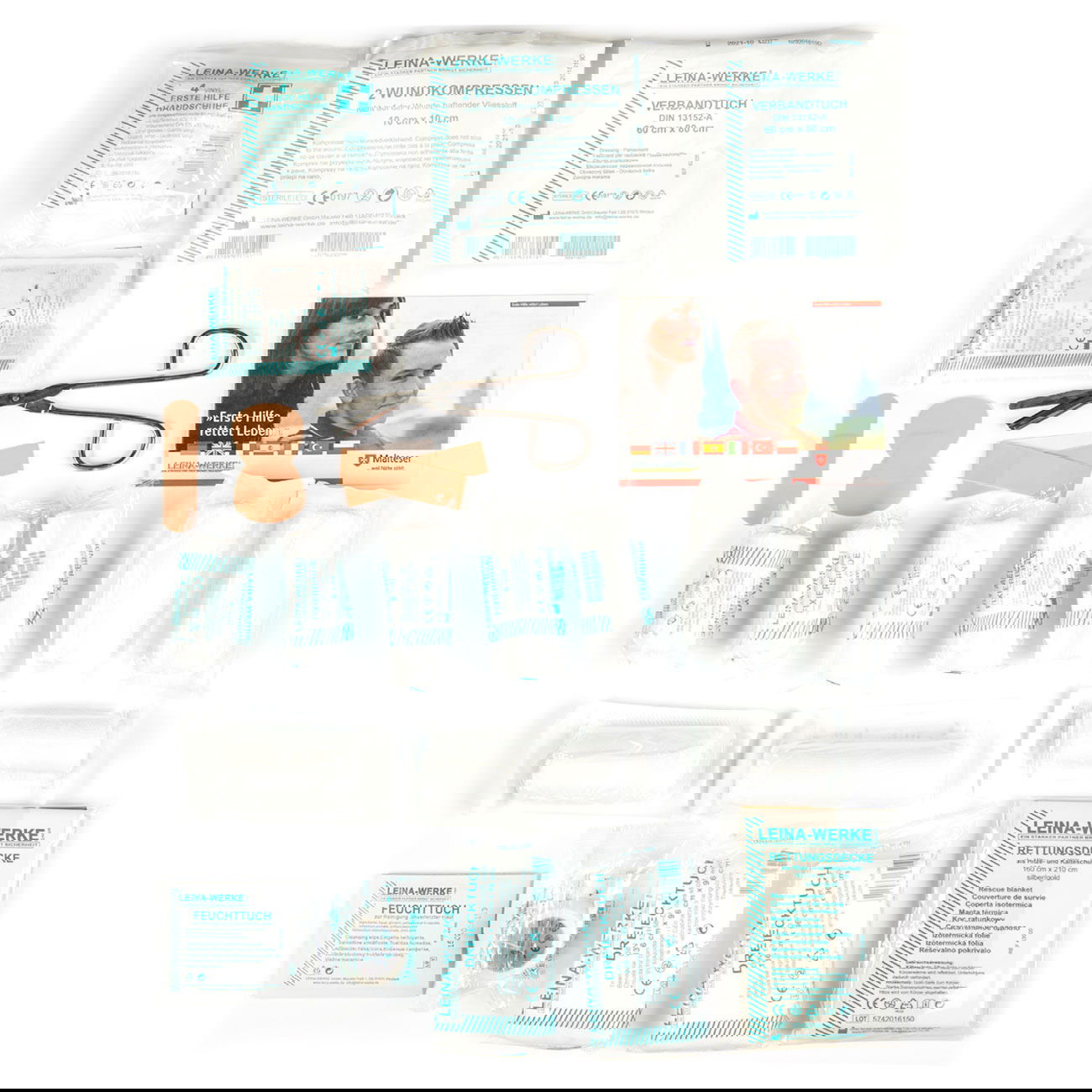 Erste-Hilfe-Set mit Verbänden, Schere und Pflastern. Ideal für Notfälle und schnelle Wundversorgung im Airsoft-Spiel.